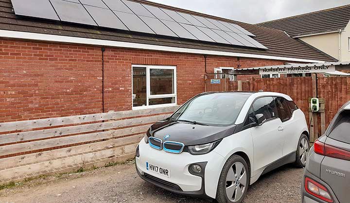 Electric car in front of a nursery