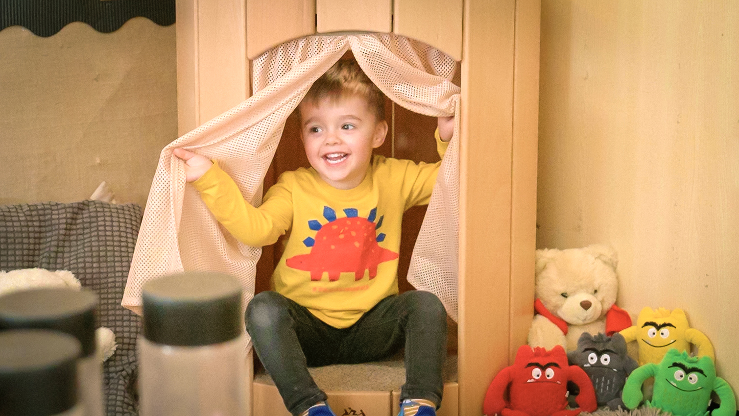 Child in hollow nook