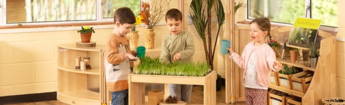 Children exploring science in a classroom